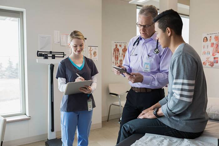 Doctor and nurse with patient